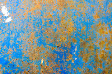 Piece of blue metal background with scratches