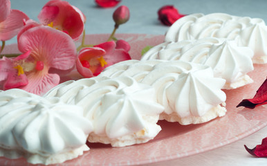 Fototapeta na wymiar White marshmallow on a plate close-up