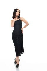 Fototapeta premium Full-length portrait of young fashion woman in black dress isola