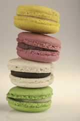 Colorful macarons stack vintage background