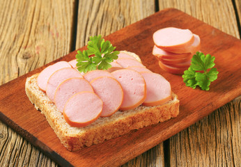 Whole wheat bread with sliced sausage