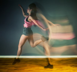 Modern hip hop dancer woman, motion blur