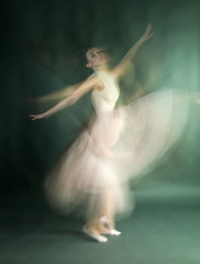 Fototapeta na wymiar Ballet dancer woman in motion blur, ballerina