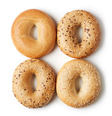 Fresh bagels on white background