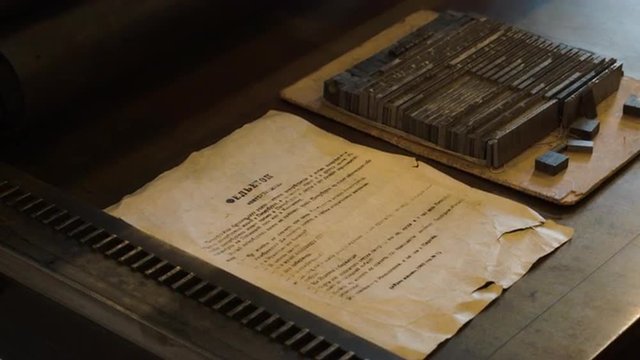 Typesetting letters metal casting at a vintage Soviet printing press