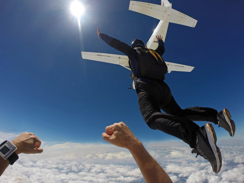 Man jump of plane, skydiving point of view.
