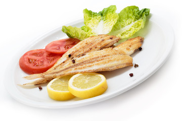 Grilled wedge sole and vegetables. Spanish sole fish