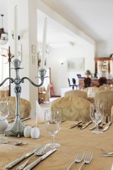 Silver cutlery and candlestick
