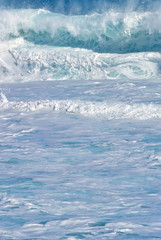 Fototapeta na wymiar Wave splash details vertical image