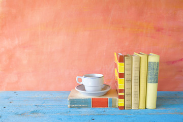 vintage books with a cup of coffee, free copy space
