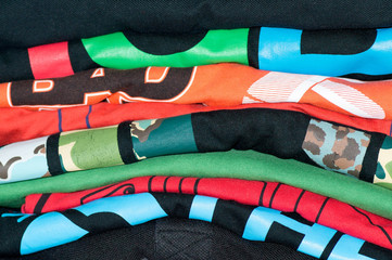 Badly folded and arranged t-shirts