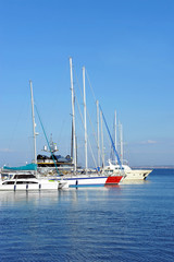 Obraz premium Motor yacht over harbor pier, Odessa, Ukraine