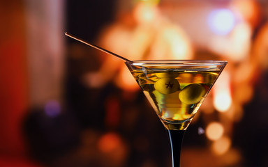 martini and green olives