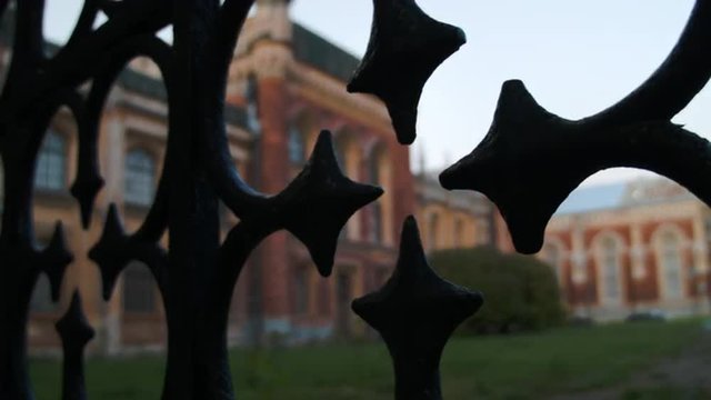 Castle seen through the gate in Peterhof Russia