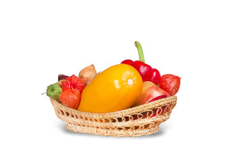 Group of various fruits and vegetables in wicker basket