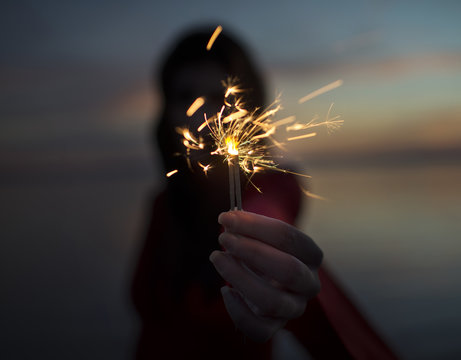 Hand holding a lighter