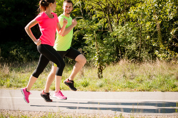 Friends running and talking together
