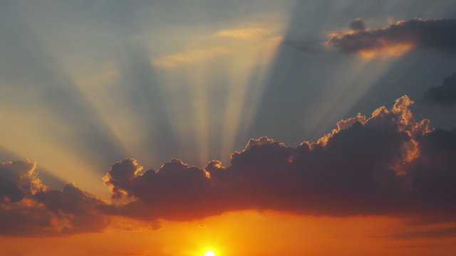 time lapse of sky and clouds ,sunset or sunrise (reverse),Clouds billowing. 4k clip.
