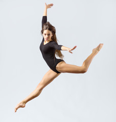 Fototapeta premium Young girl engaged art gymnastic