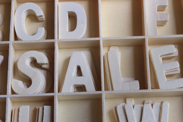 Word sale made with wooden letters alphabet