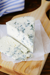 blue cheese on cutting board