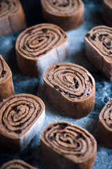 Fototapeta na wymiar Delicious cinnamon rolls before baking