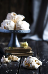 Meringue cookies on cake stand