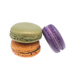 Tasty colorful macaroon on white background