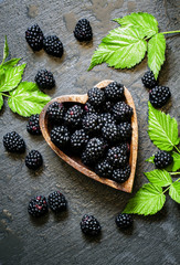 Blackberries in bowl in the shape of a heart, a top view