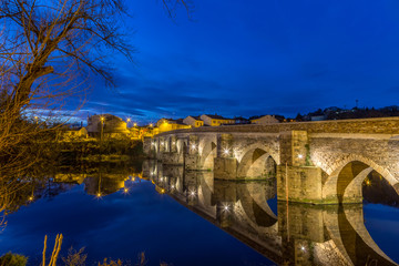 The Roman Bridge in Lugo during blue hour at the Camino Primitivo, a World Heritage