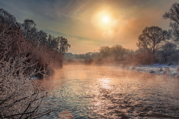 Fototapeta na wymiar frosty misty morning on the rive