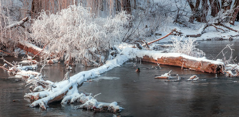  winter river with frost covered trees
