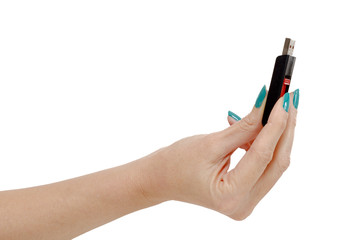 Woman hand holding up a flash drive isolated on a white backgrou