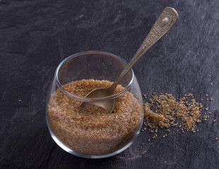 Brown sugar on the shale background