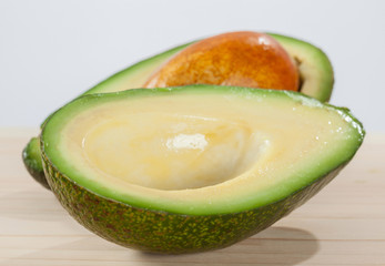 Appetizing avocado on wooden table