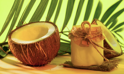 Fresh coconut and a bottle of coconut butter