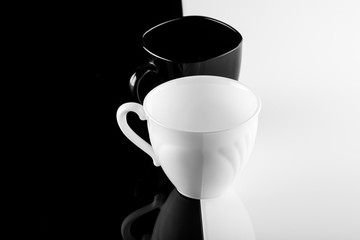 coffee cups on white and black
