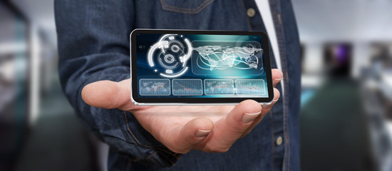 Young man using modern mobile phone