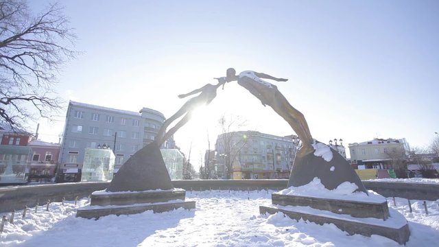 man and woman kiss, sculpture