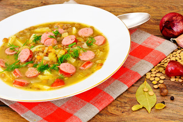 Healthy and Diet Food: Soup with Lentils, Celery and Sausage