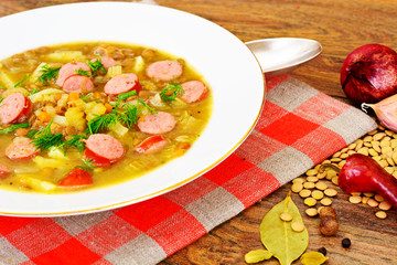 Healthy and Diet Food: Soup with Lentils, Celery and Sausage