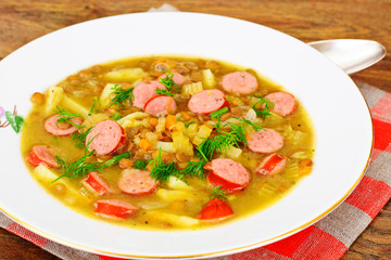 Healthy and Diet Food: Soup with Lentils, Celery and Sausage