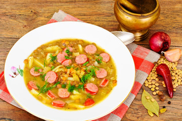 Healthy and Diet Food: Soup with Lentils, Celery and Sausage