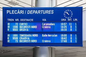 Naklejka premium Departures board on the train station in Drobeta Turnu Severin, Romania. Electronic romanian panel