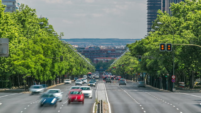 Paseo de la Castellana street traffic timelapse near Puerta De Europa towers as viewed from Plaza de Castilla, Madrid