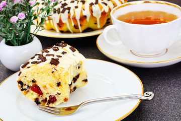 Easter Cake with White Icing, Tea and Chocolate