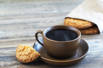 Cup of coffee and  round cookies