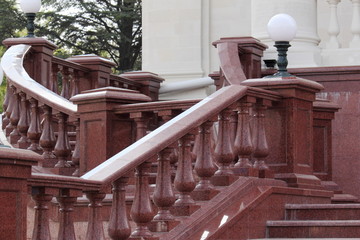 Granite balustrades / railing made of red granite. Architectural elements.