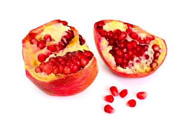 Natural Mature the Broken Red Pomegranate on White Background. 