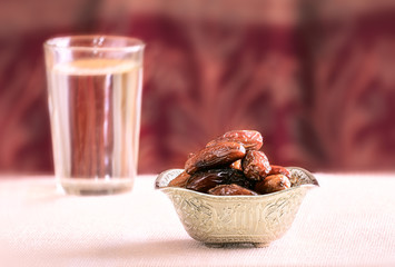 Beautiful bowl full of date fruits symbolizing Ramadan